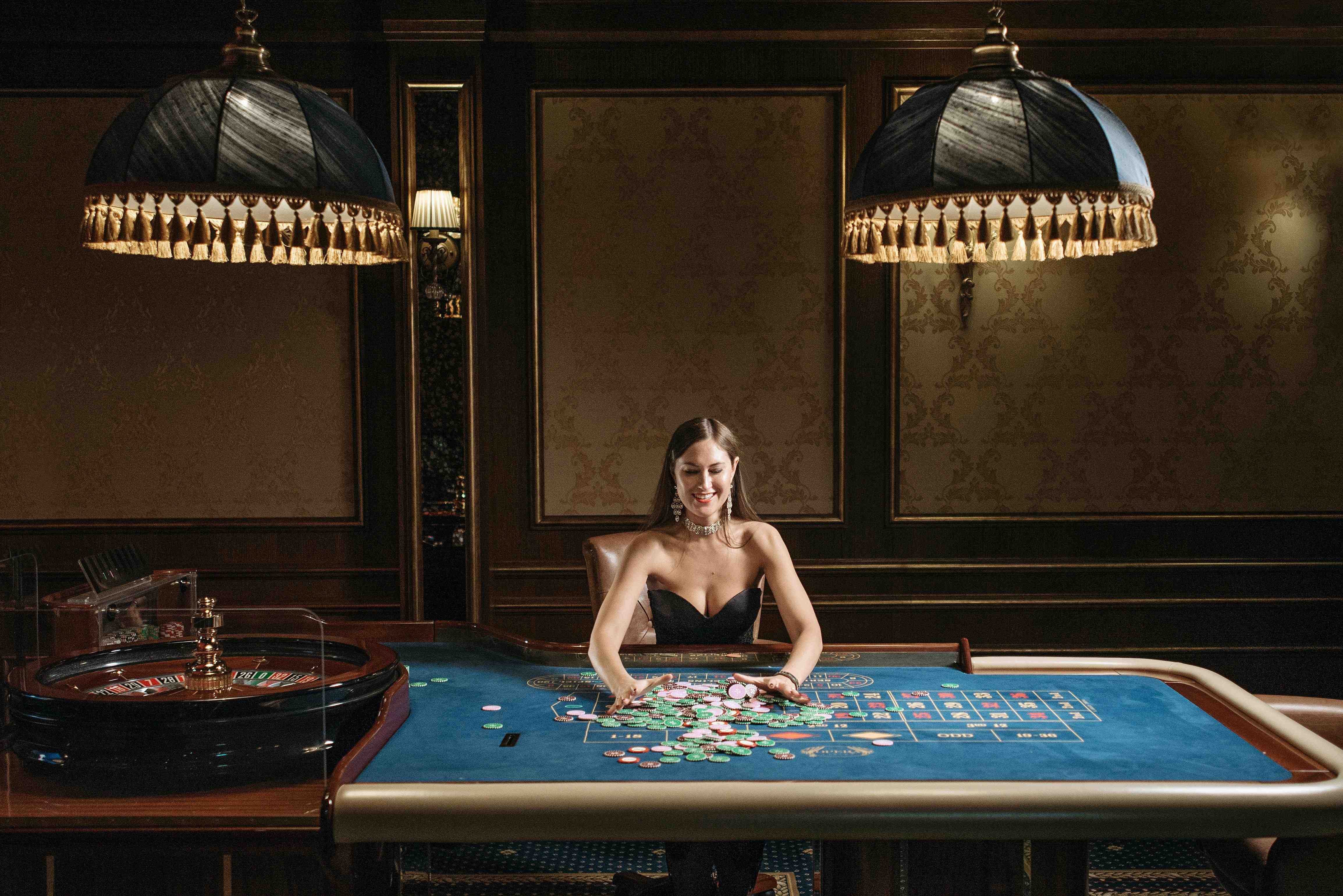 taya777 Live Casino table options including blackjack and roulette on screen